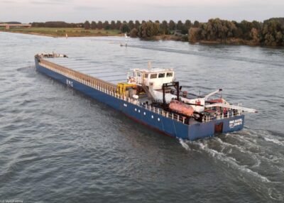 RMS Baerl on river Waal passing Beneden-Leeuwen, 10-08-2021