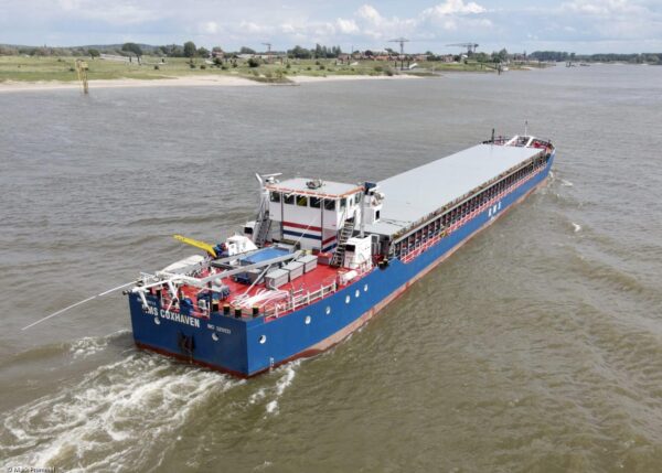 RMS Cuxhaven on river Rhine passing Tolkamer, 06-06-2022
