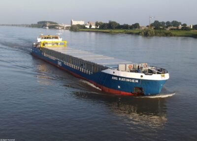 RMS Ratingen on river Rhine passing Spijk, 02-07-2021