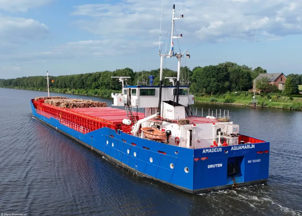 Amadeus Aquamarijn in Kiel Canal passing Hohenhörn, 23-07-2024