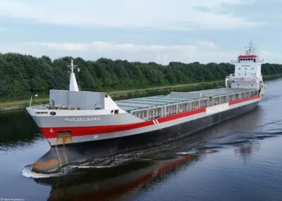Moezelborg in Kiel Canal passing Hohenhörn, 23-07-2024
