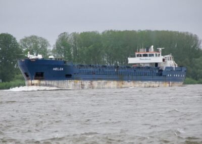 Helga on river Rhine passing Tolkamer, 31-05-2006
